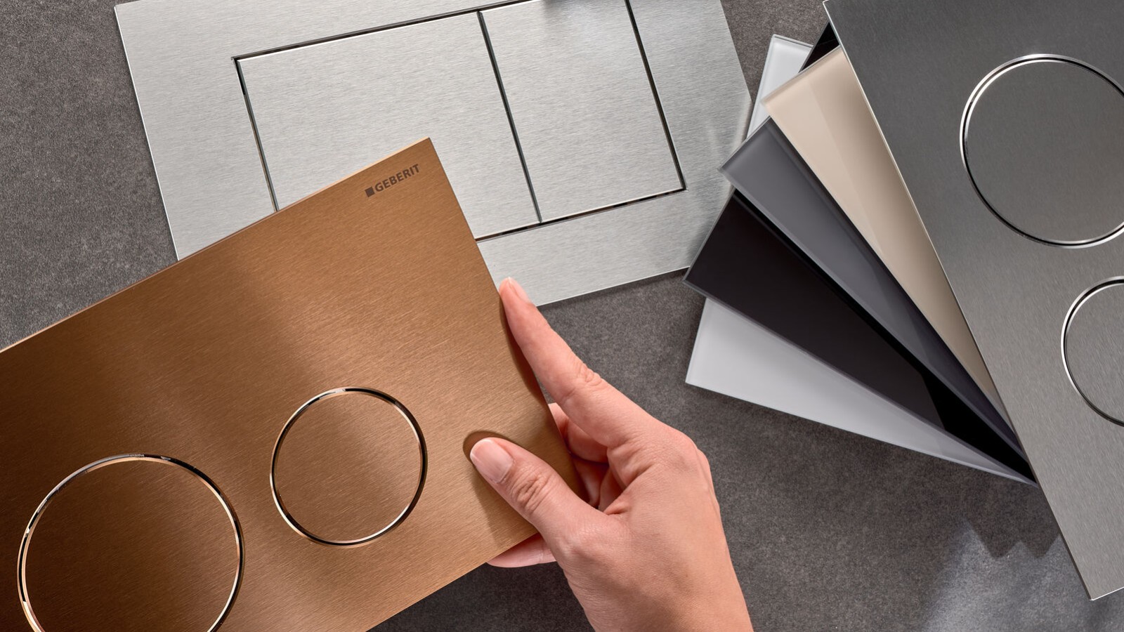 Geberit Sigma40 spolplatta med olika ytbehandlingar och former på knapparna