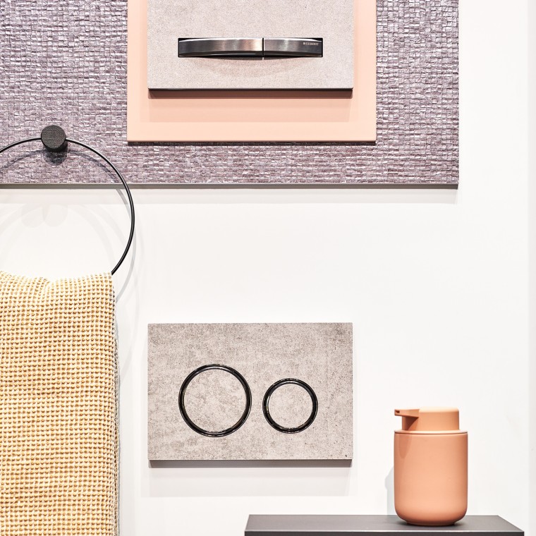 En mix av olika material i badrummet gör det varmt och inbjudande