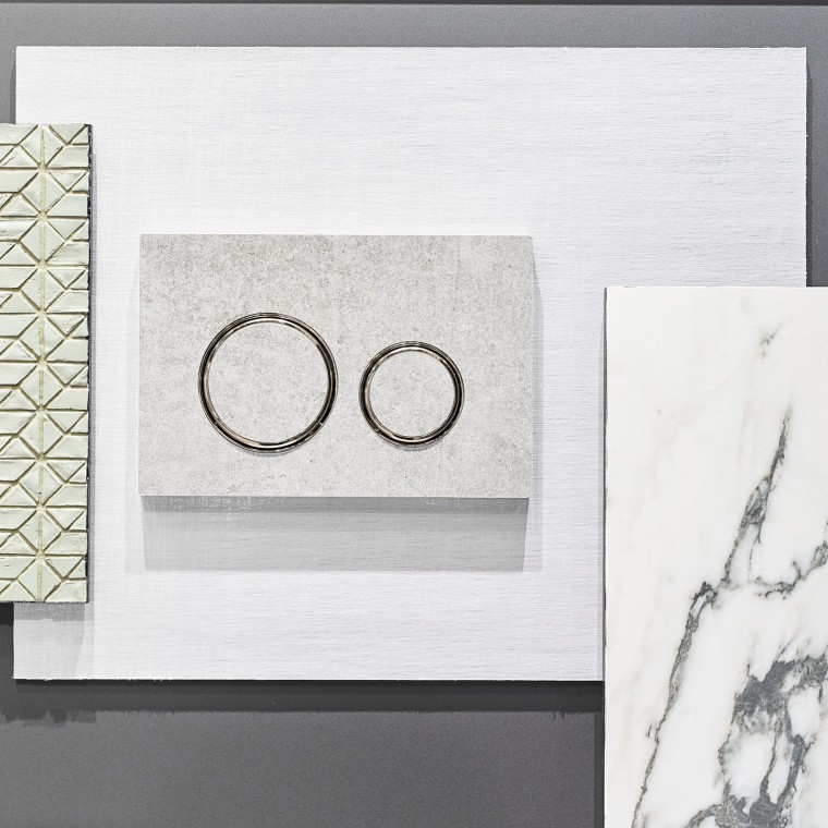 Spolplattan Sigma 21 i betonglook med kromade designringar