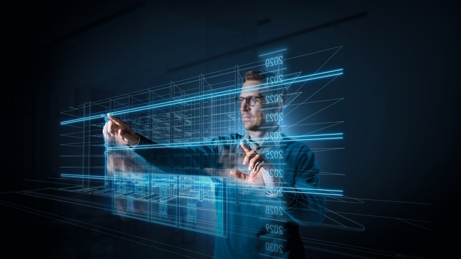 Planerare framför en skärm Planerare framför en skärm