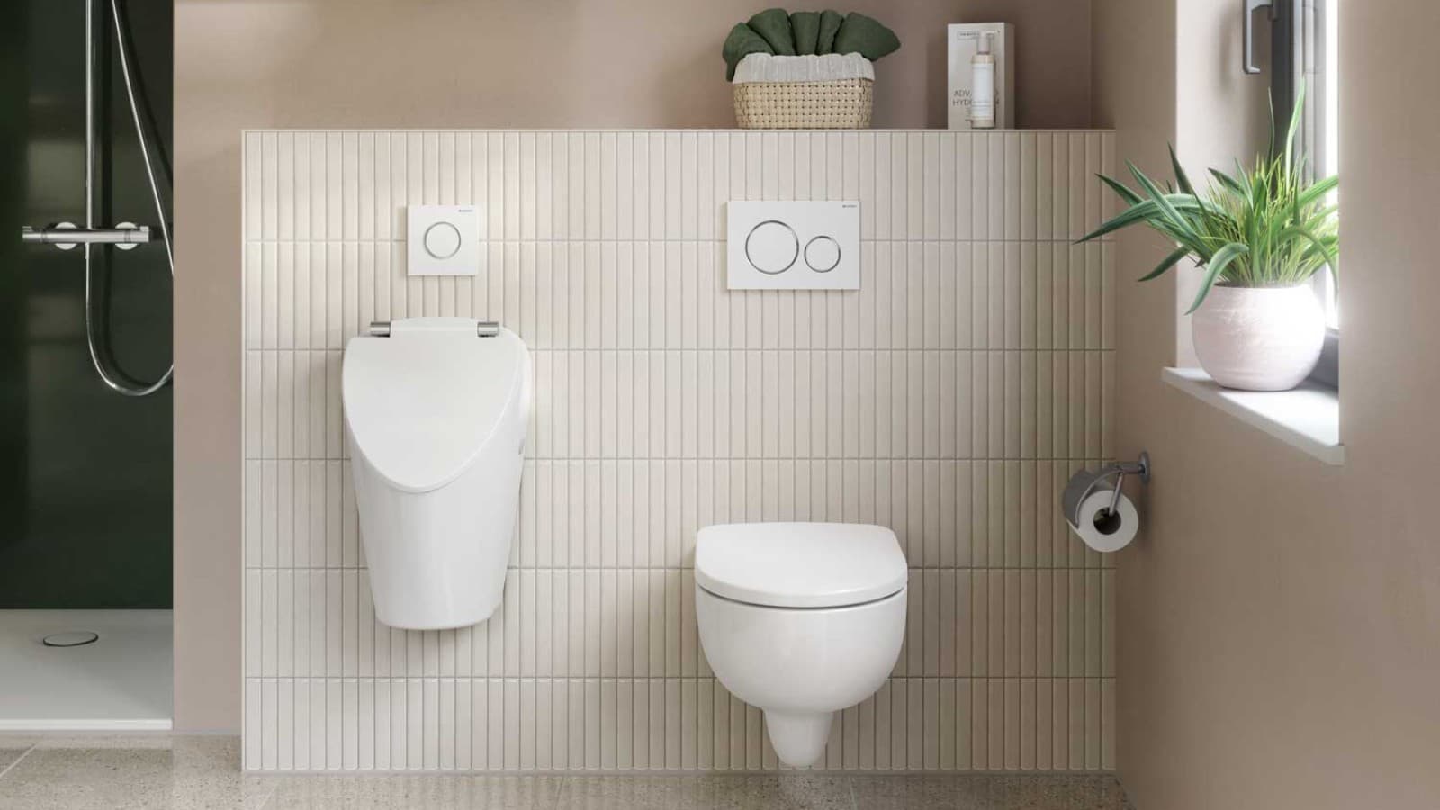 Geberit urinaler i ett badrum Geberit urinaler i ett badrum